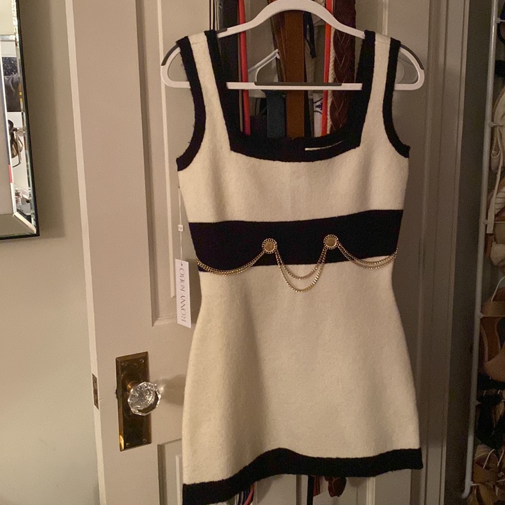 Beautiful & timeless. This Ronny Kobo dress is the perfect add to your wardrobe.